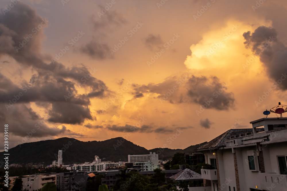 A dramatic sunrise over the city of Patong from the southern hillside.