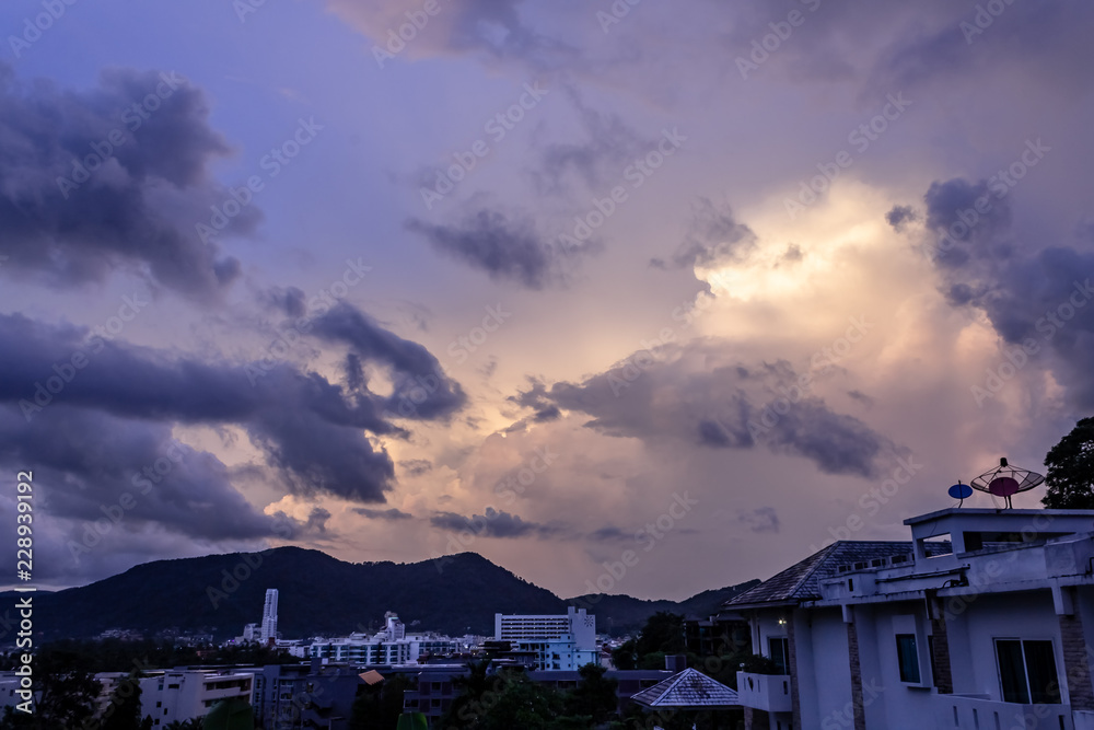 A dramatic sunrise over the city of Patong from the southern hillside.