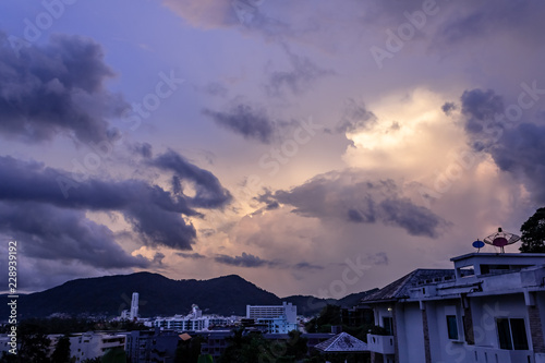 Obraz na płótnie A dramatic sunrise over the city of Patong from the southern hillside. w salonie