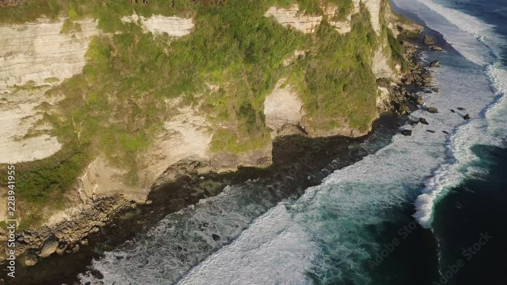 Stone cliffs, ocean waves and oceanscape Stone cliffs, ocean waves and oceanscape