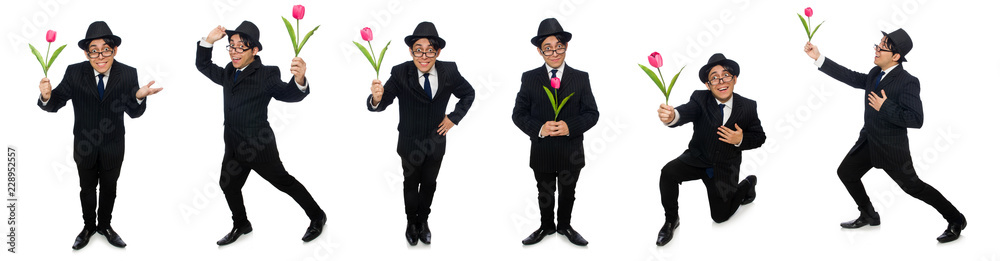 Young man in black costume with flower isolated on white Young man in black costume with flower isolated on white