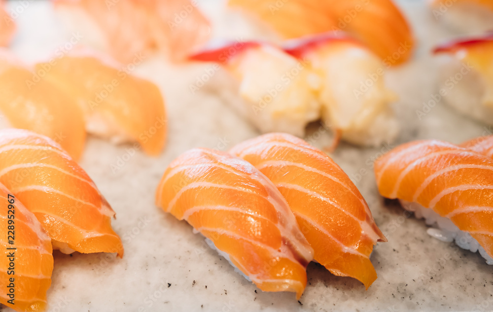 Fresh japanese salmon sushi on the marble plate Fresh japanese salmon sushi on the marble plate