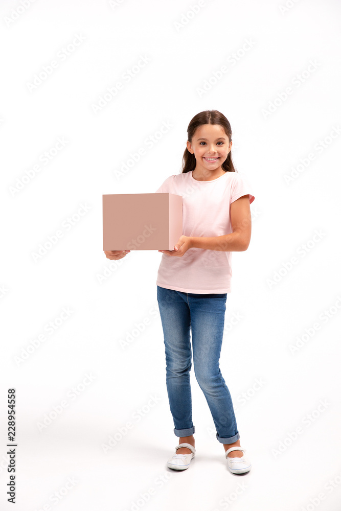 little girl with box isolated over white background little girl with box isolated over white background