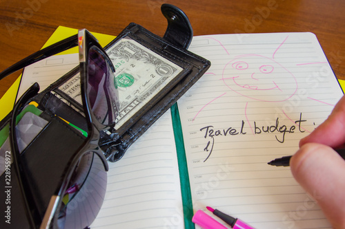 Preparing for the trip. budget for travel. List and money.