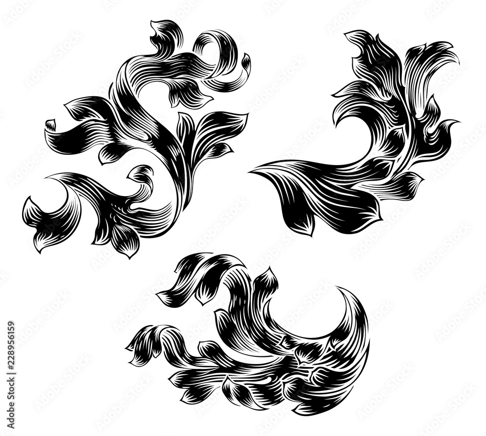 A set of  heraldic floral filigree pattern scroll decorative designs
