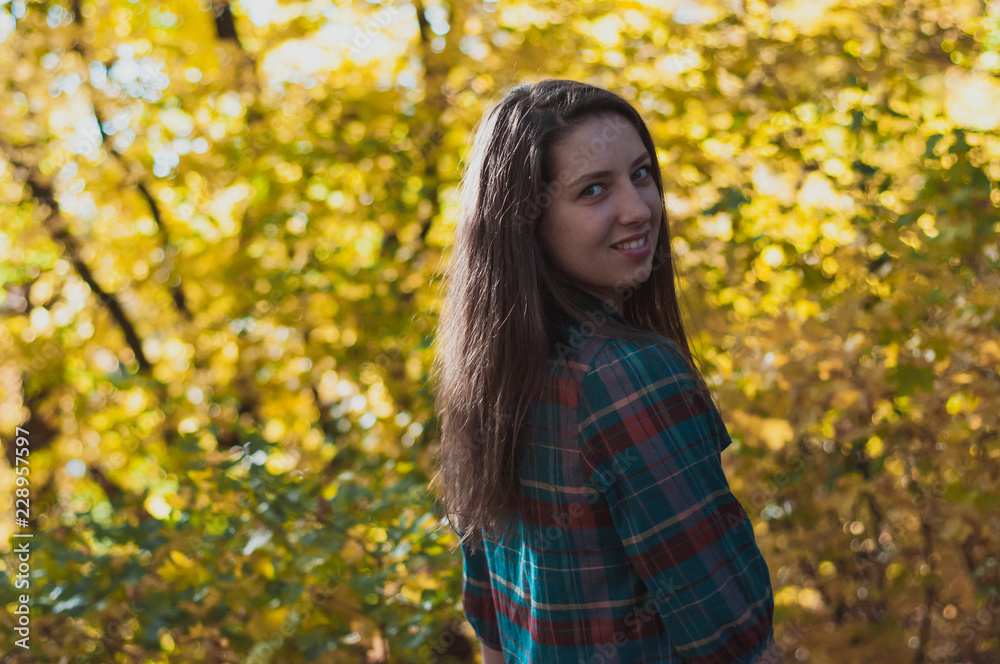 Portrait of Young Fashion Woman Outdoor on Autumn Background Portrait of Young Fashion Woman Outdoor on Autumn Background