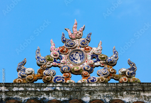 Decoration on a temple roof in Vietnam
