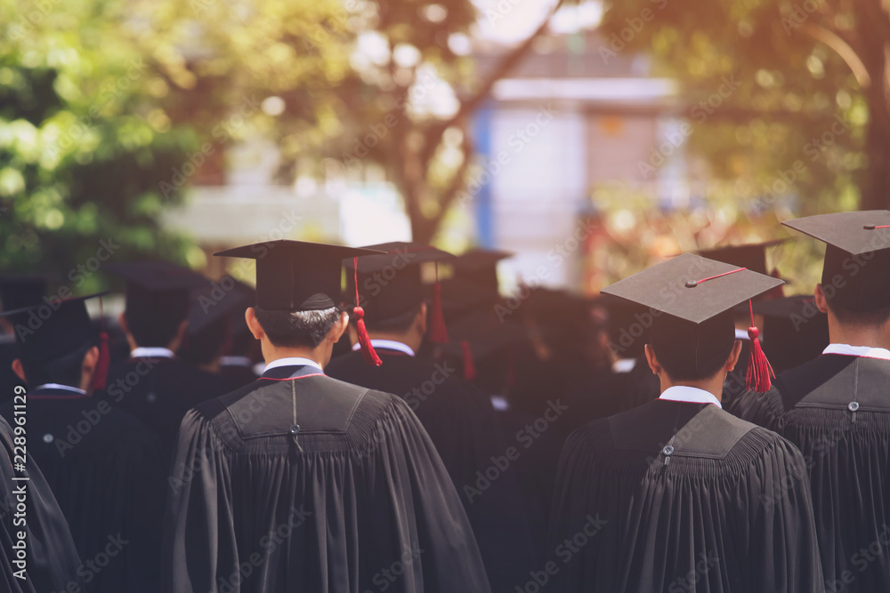 Group of Graduates during commencement. Concept education congratulation in University Degree. Graduation Ceremony Group of Graduates during commencement. Concept education congratulation in University Degree. Graduation Ceremony