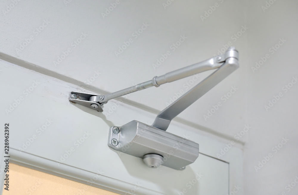 Naklejka premium Automatic hydraulic leaver hinge door.