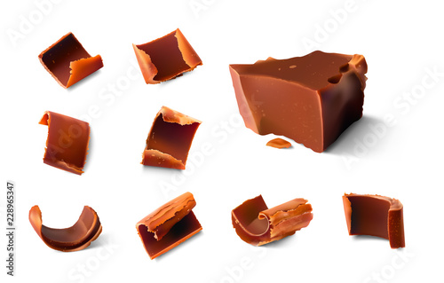 Realistic chocolate pieces and shavings. Vector illustration isolated on white background. Ready for your design. EPS10.