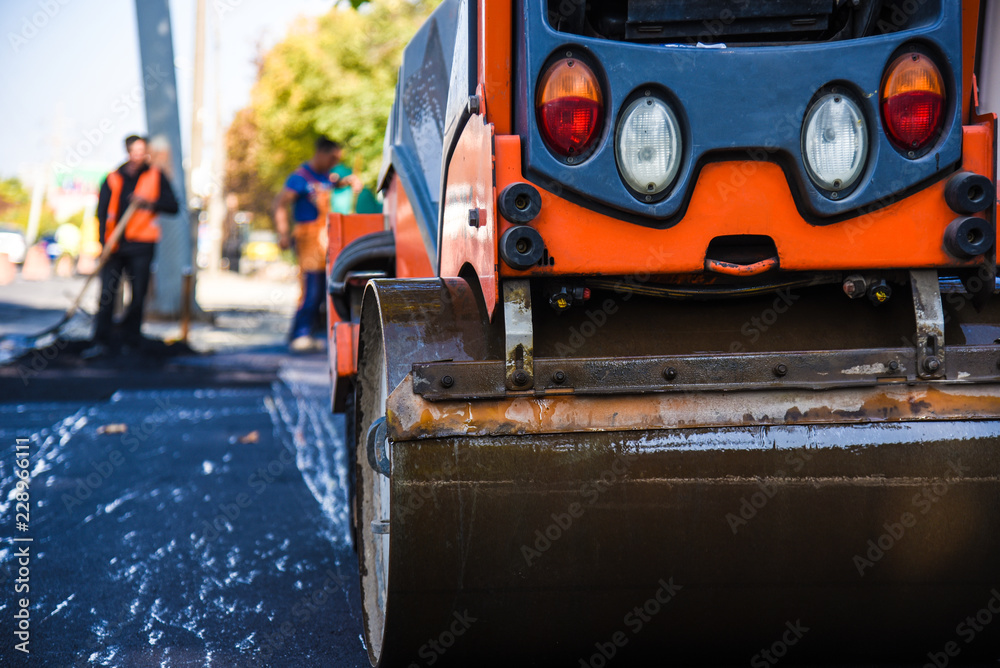 Fototapeta premium laying asphalt on the new road