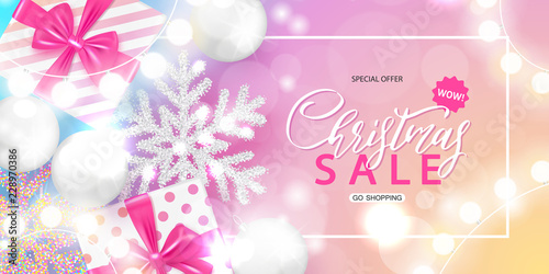 Christmas Sale poster with shiny Christmas balls, gift boxes, snowflakes,garland and serpentine. Vector illustration. Design for invitation, banners, ads, coupons, promotional material.