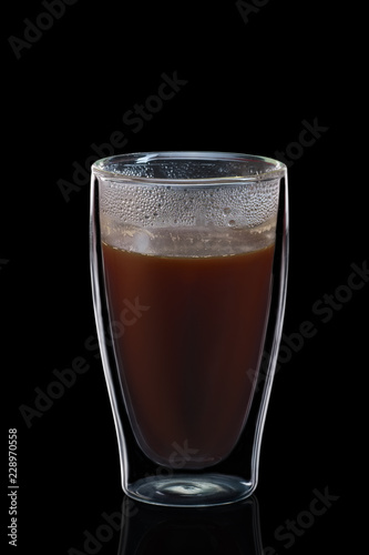 Double-walled glass with coffee isolated on black. Photo with clipping path.