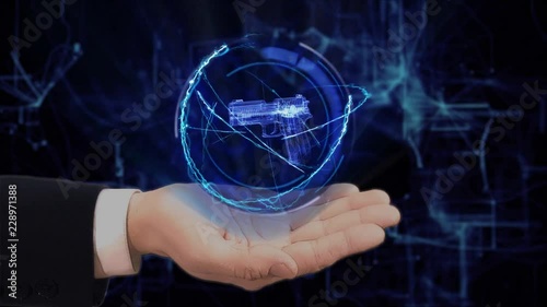 Painted hand shows concept hologram 3d gun on his hand. Drawn man in business suit with future technology screen and modern cosmic background photo