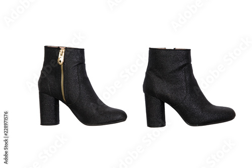 black glitter ankle boots with golden zipper; isolated on white background