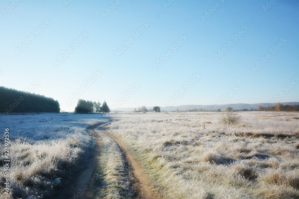 Dirty rural road in autumn fall field, meadow, countryside. Freedom and dream concept dramatic sky Dirty rural road in autumn fall field, meadow, countryside. Freedom and dream concept dramatic sky