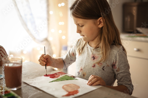 Children's creativity, child draws with brush