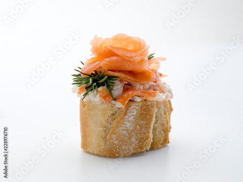 Pincho de salmón, con trozos de txaka y una ramita de romero 2 photo
