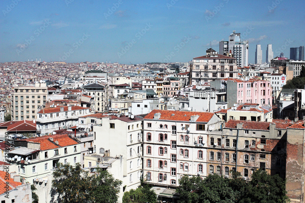 View of old white mediterranean houses with red roofs in Lisbon, Portugal