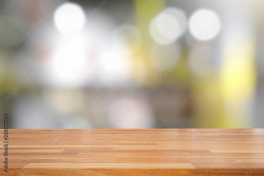 Empty wooden table and interior background, product display, blurred yellow light interior background with bokeh, Ready for product montage Empty wooden table and interior background, product display, blurred yellow light interior background with bokeh, Ready for product montage