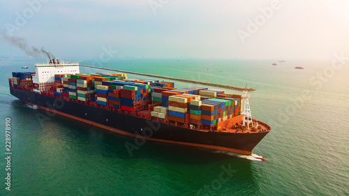 Logistics and transportation of Container Cargo ship and Cargo import/export and business logistics,Aerial view from drone