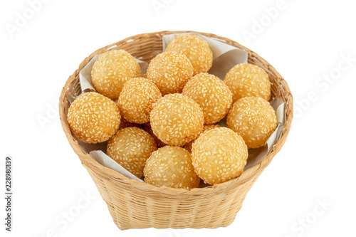 Traditional asian dessert, sesame ball in basket on white background , save with Clipping Path