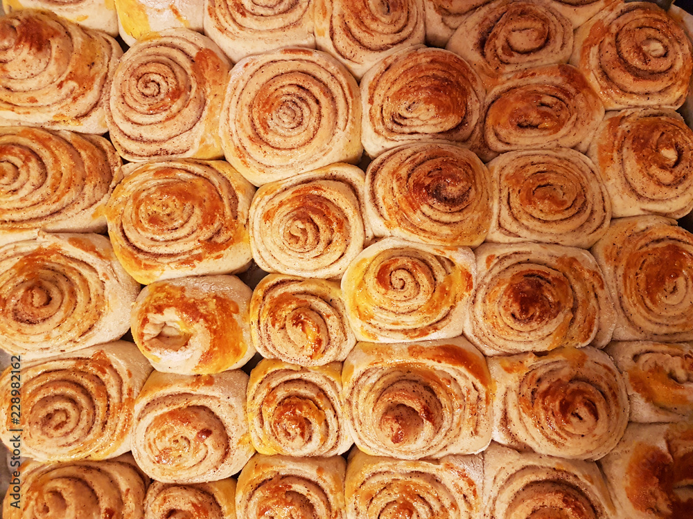 top view of cinnamon rolls side by side for background top view of cinnamon rolls side by side for background
