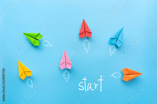 Paper planes on blue background. Different vision creative, Innovative and Solution for Business concepts.