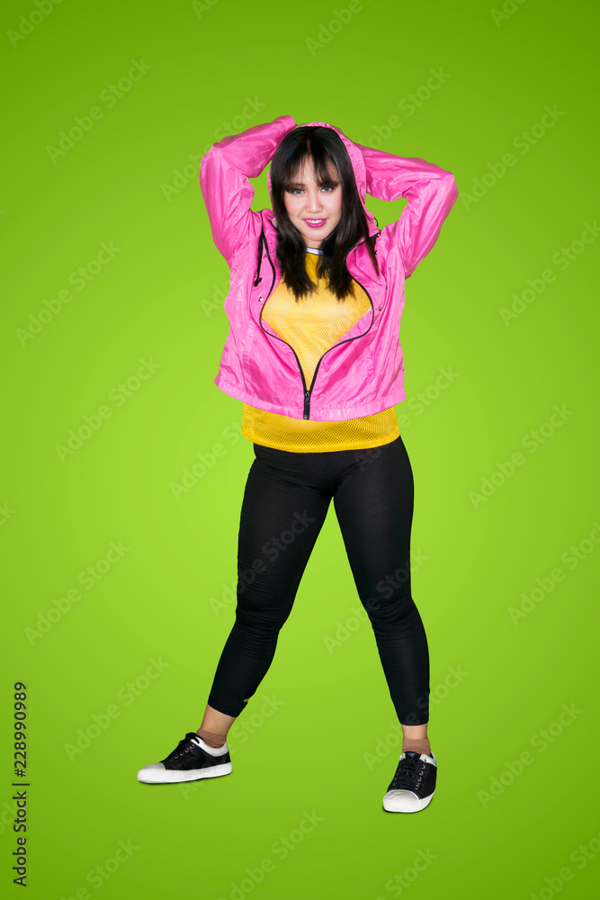 Pretty hip hop dancer smiling at the camera Pretty hip hop dancer smiling at the camera