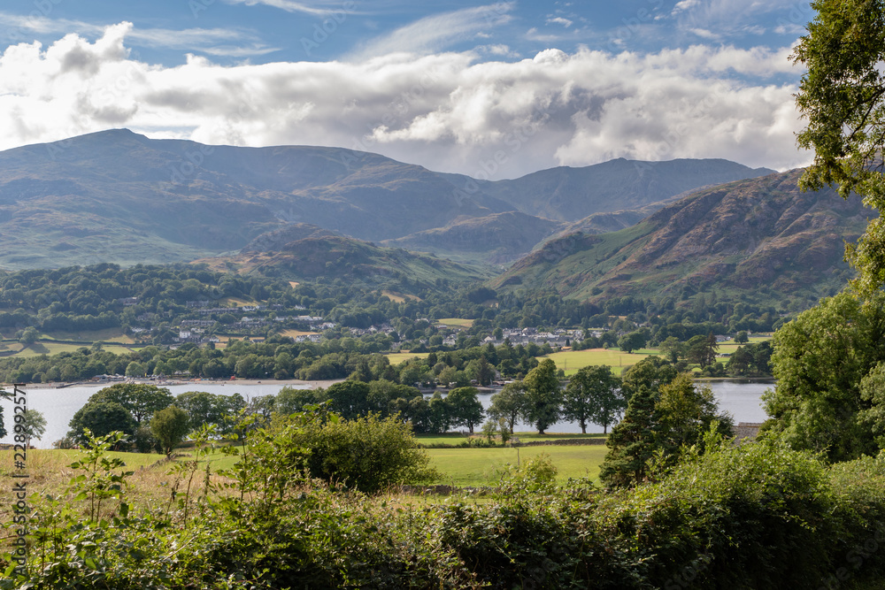 Lake Coniston Water and Coniston village in background in the Lake District National Park, UK