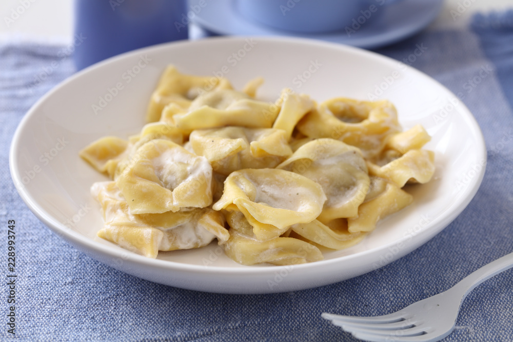 Ravioli under cream sauce