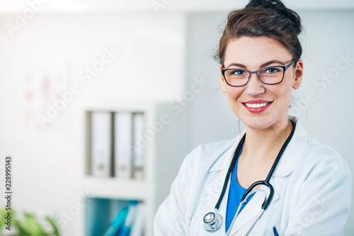 Portrait of Woman Doctor at her Medical Office
