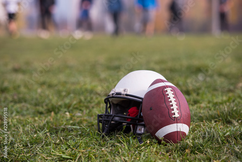 American football helmet and ball