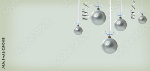 Collection of Christmas baubles on a shiny light background