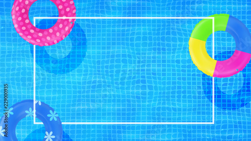 Swim rings on swimming pool water background. Frame for text. Inflatable rubber toy. Realistic summertime illustration. Summer vacation or trip concept. Top view swimming circles.