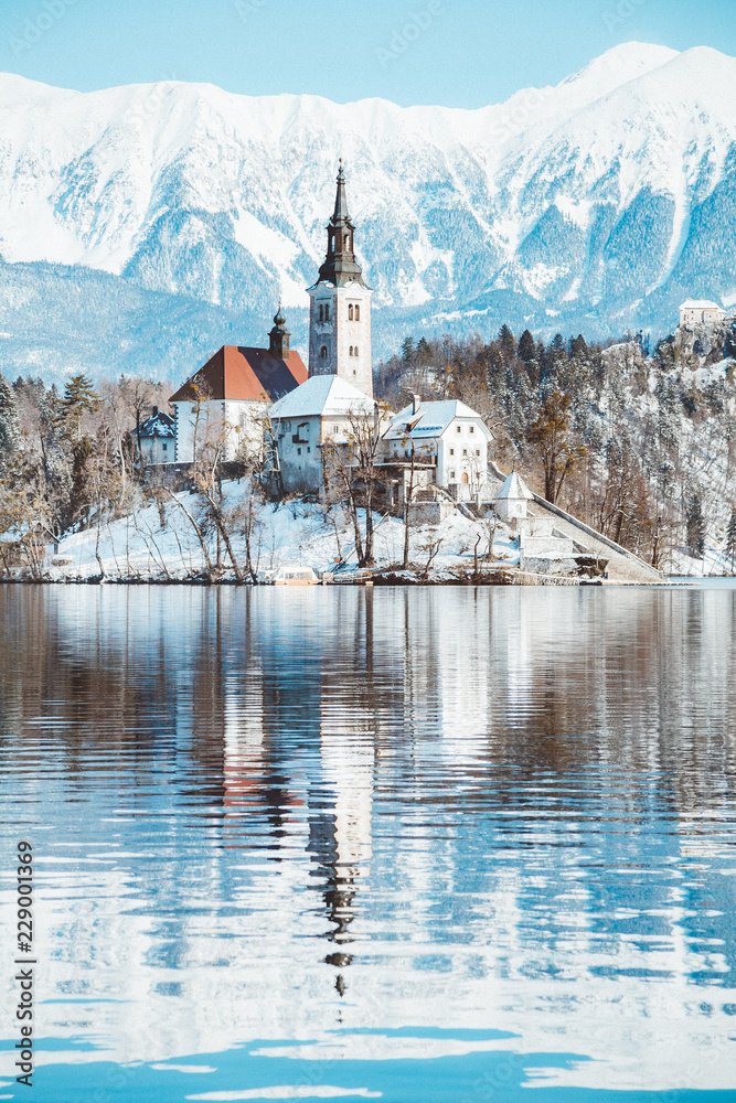 Lake Bled with Bled Island and Castle at sunrise in winter, Slovenia