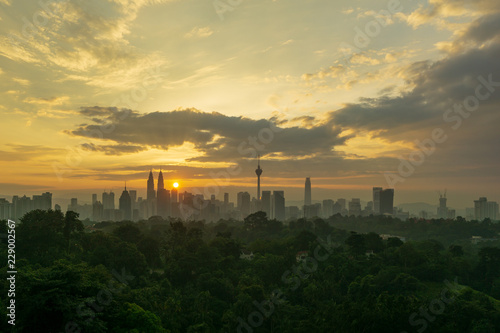 Photography View of cloudy sunrise over downtown Kuala Lumpur, Malaysia