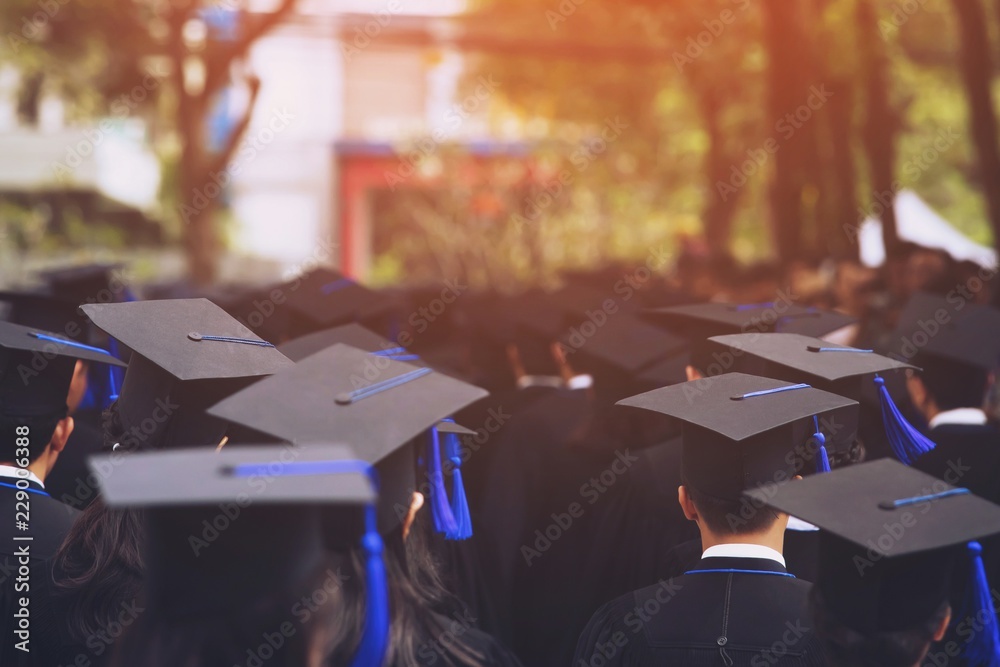 Group of Graduates during commencement. Concept education congratulation in University Degree. Graduation Ceremony Group of Graduates during commencement. Concept education congratulation in University Degree. Graduation Ceremony