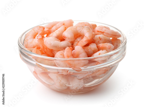 Glass bowl of boiled peeled shrimps