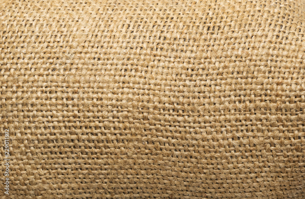Burlap texture background closeup. tied little ropes Burlap texture background closeup. tied little ropes