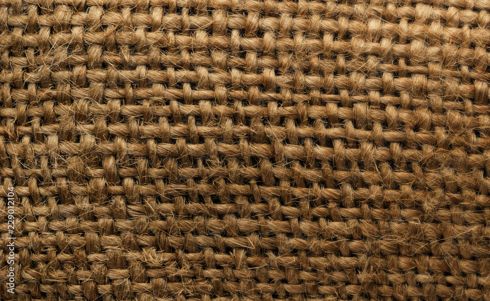Burlap texture background closeup. tied little ropes Burlap texture background closeup. tied little ropes