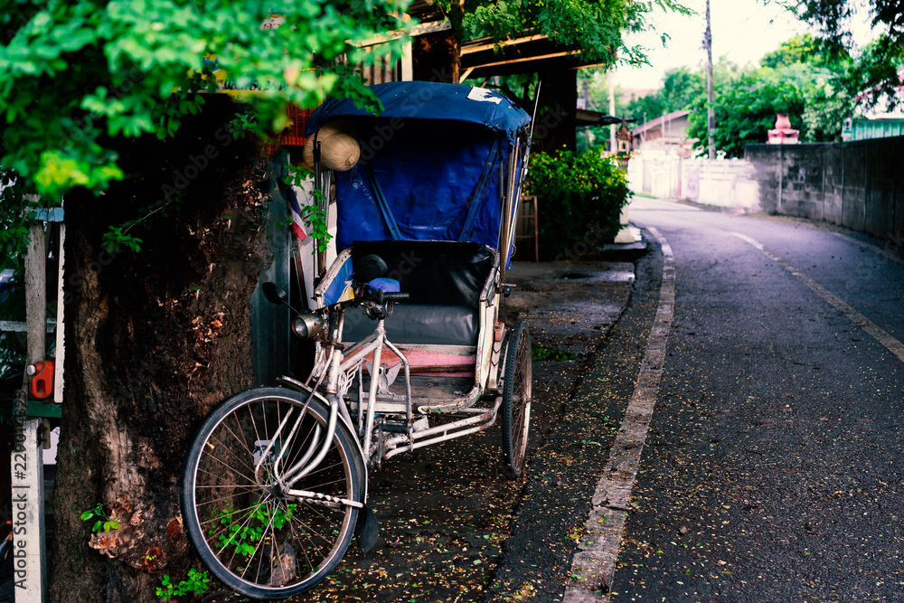 Tricycle on roadside in countryside