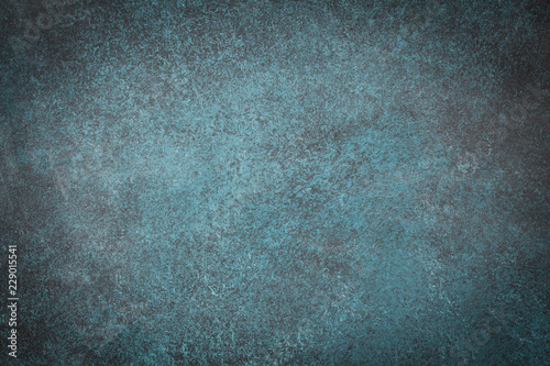 Dark green slate background. Stone or concrete surface