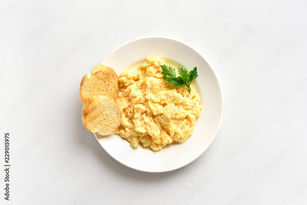 Scrambled eggs on plate Scrambled eggs on plate