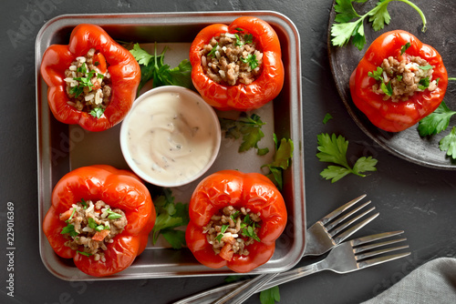 Stuffed red peppers with minced meat, rice, onion