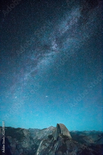 Obraz na płótnie Starry night sky with Milky Way above Half Dome peak, Yosemite National Park, USA w salonie