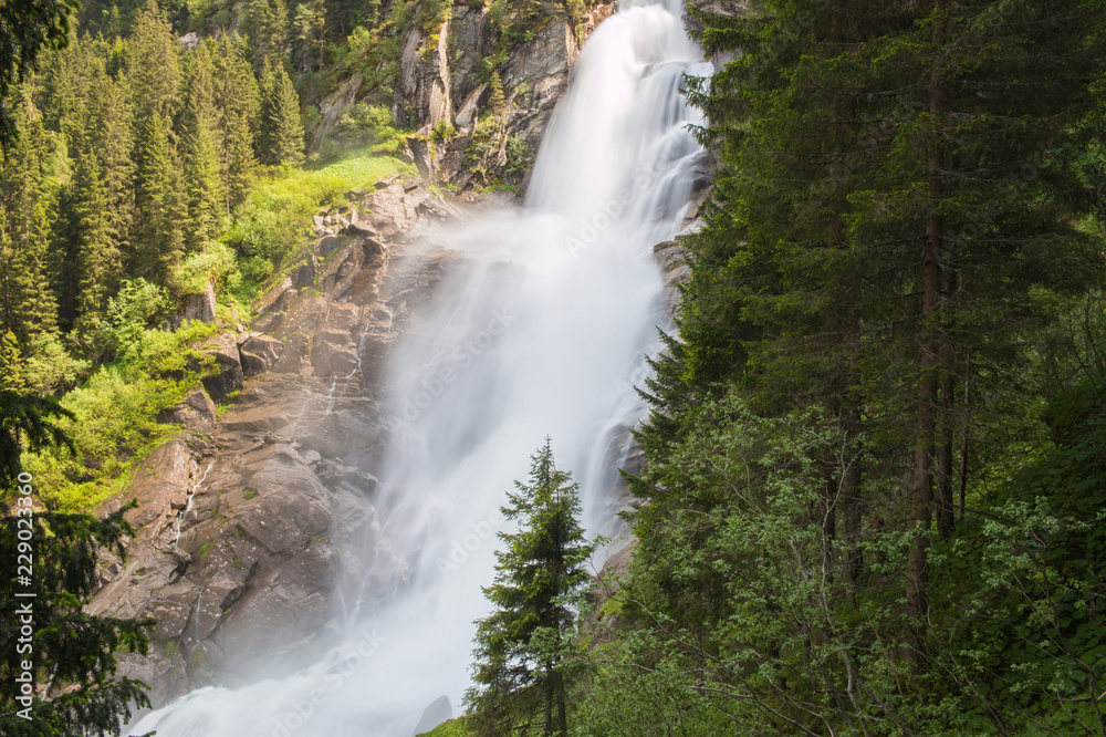 View Alpine inspiring Krimml waterfall in mountains in summer day. Trekking in National park Hohe Tauern, Austria View Alpine inspiring Krimml waterfall in mountains in summer day. Trekking in National park Hohe Tauern, Austria