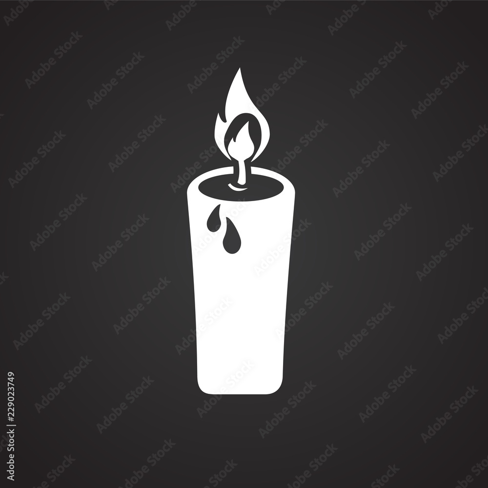 Christmas candle on black background icon Christmas candle on black background icon