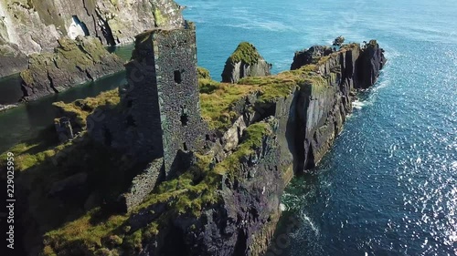 Castle in island above the sea in Ireland