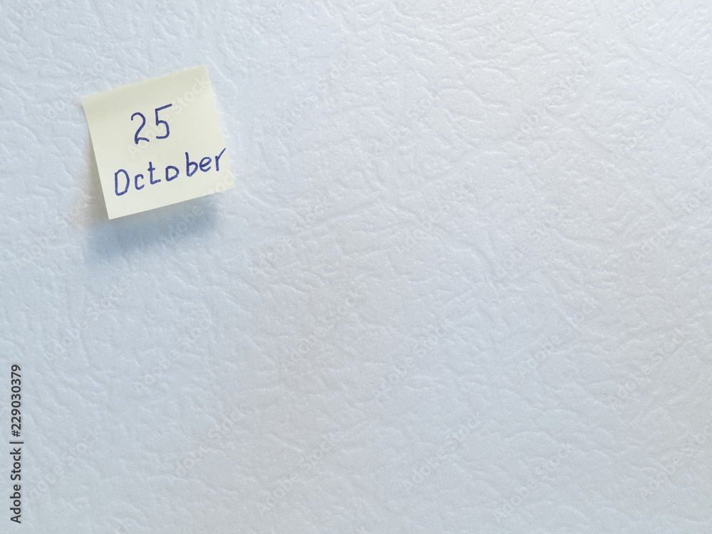 October 25. Calendar date on a yellow sticky note with copy space on white background. October 25. Calendar date on a yellow sticky note with copy space on white background.